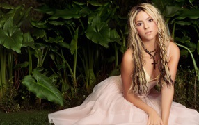 Singer Shakira in a white dress