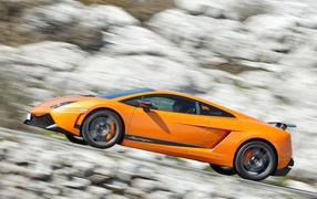 	   Orange Lamborghini speed