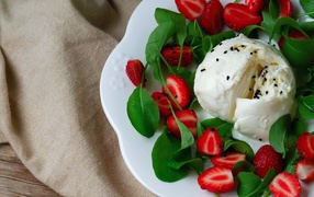 	  Ice-cream with strawberries and leaves