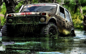 Lada Niva SUV in the mud