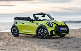 2021 MINI John Cooper convertible on the sand by the sea