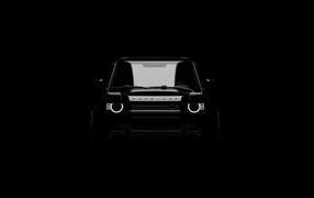 Land Rover Defender car on a black background