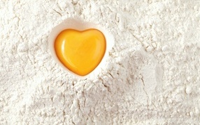 Heart made from yolk on flour