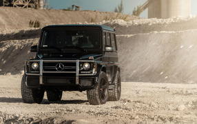 Black Mercedes G Wagon jeep in the mountains