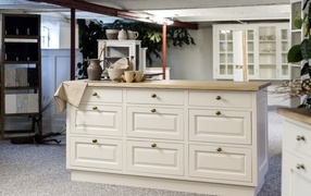 Large white chest of drawers in the room