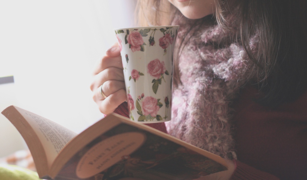 	   Girl with a book and a Cup