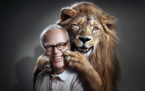 Lion hugs trainer