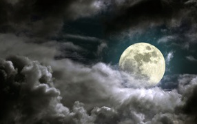 Moon among the night clouds