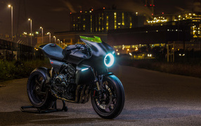 Black motorcycle Honda CB4 Interceptor with the included headlight