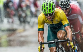 Cyclists racing in the rain