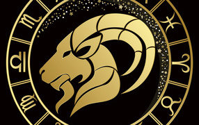 Golden Capricorn zodiac sign on a black background