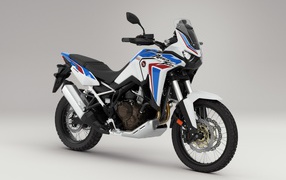 Motorcycle Honda CRF 1000 D AFRICA TWIN, 2020 on a gray background