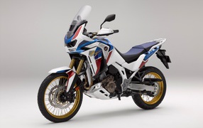 Sports motorcycle Honda CRF 1000 D, 2020 on a gray background