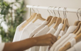 Many white shirts on a hanger