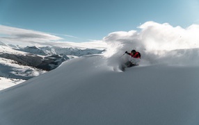 A man skiing down a mountain