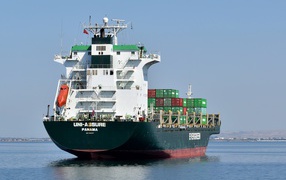 Large cargo tanker with containers at sea