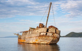 Old wrecked ship on the shore