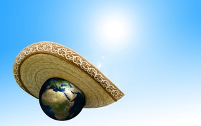 Planet earth in a sombrero on a blue background