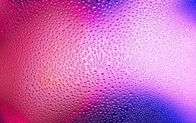 Pink background in water drops