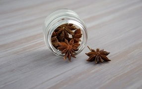 Anise in a glass jar on the table
