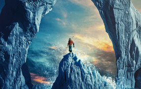 Superhero Aquaman stands on an iceberg