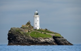 Lighthouse on an island in the sea