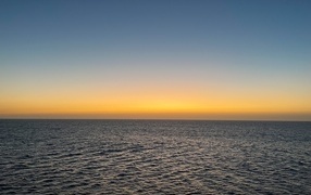 Sunset on the horizon over the sea