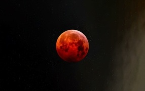 Big red moon in the starry sky