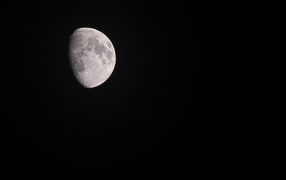 Half moon in black sky