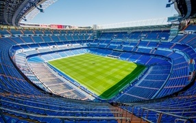 Large stadium with blue seats