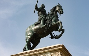 Statue of a rider on a horse close up