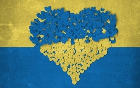 Heart made of hearts on the background of the Ukrainian flag