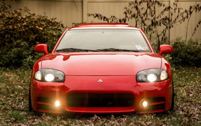 Front view of a red Mitsubishi 3000GT car