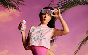 American model Emily Ratajkowski on a pink background