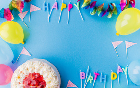 Birthday decor with cake on blue background