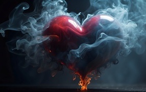 Большое горящее красное сердце в дыму