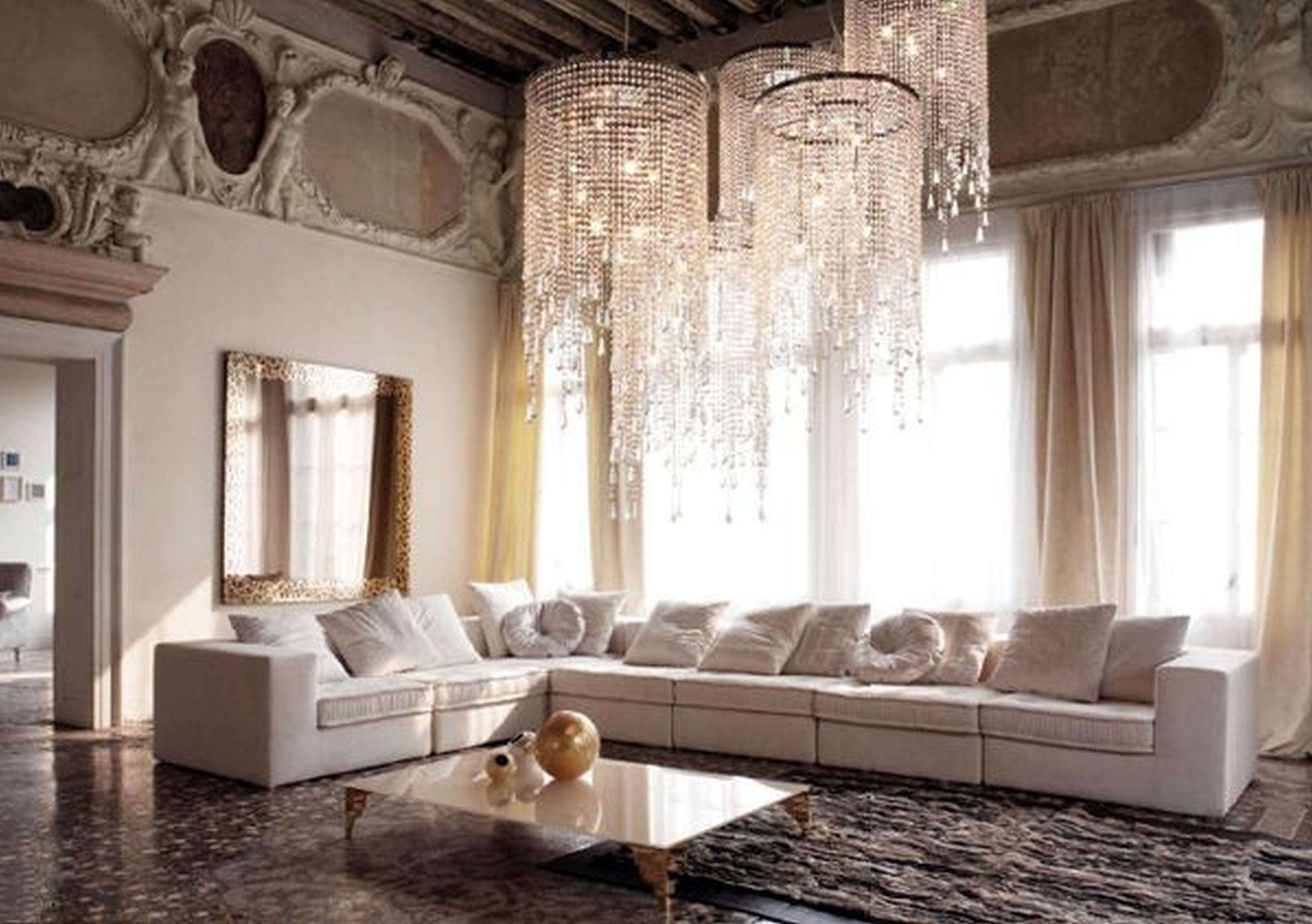 A large chandelier in the living room wallpapers and images