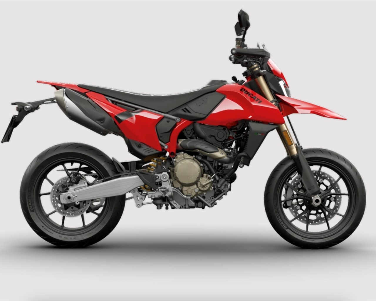 Мотоцикл Ducati Hypermotard 698 на сером фоне