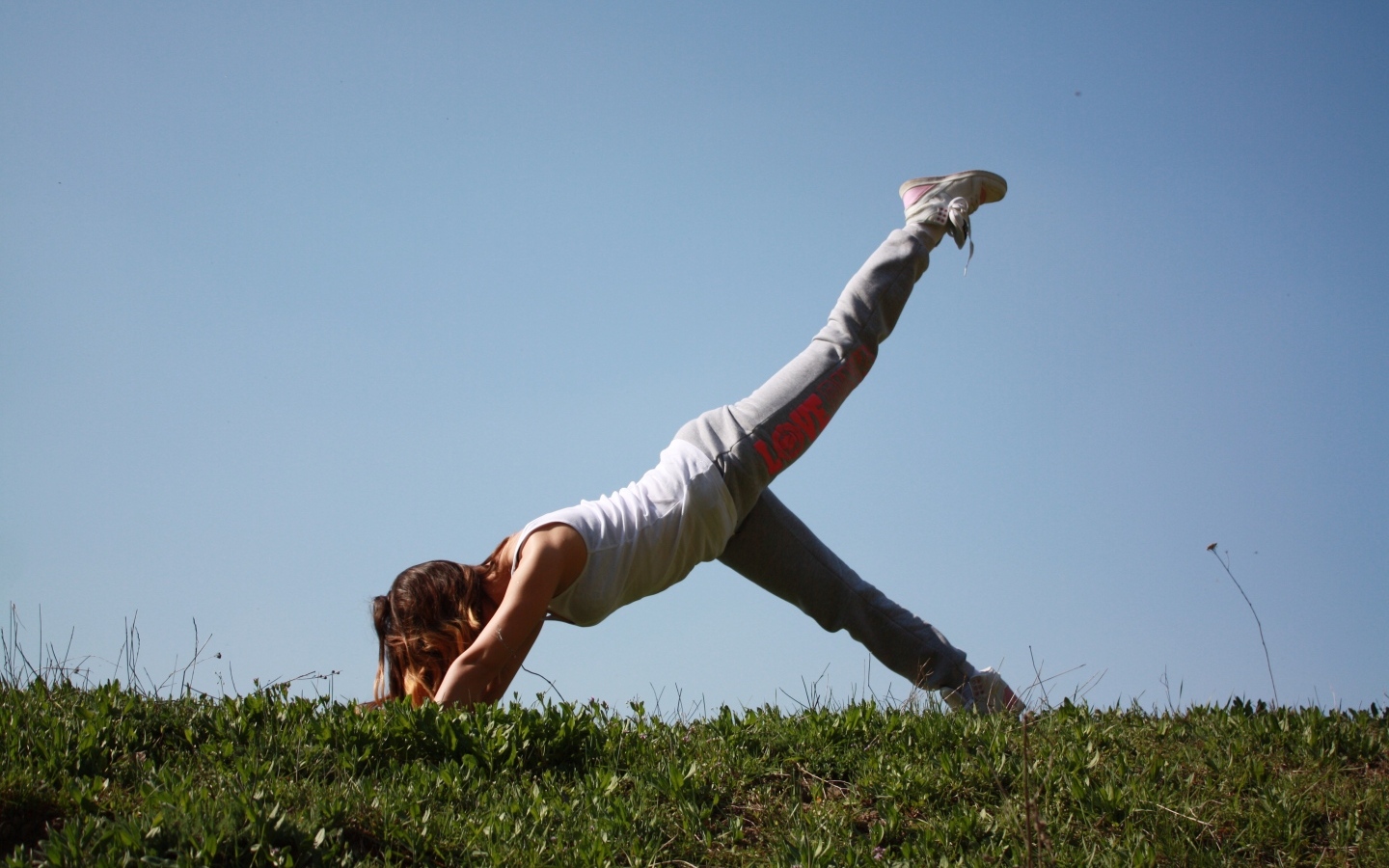 Girl doing yoga in nature